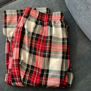 Red white and black pajama pants with gold detailing size medium never worn